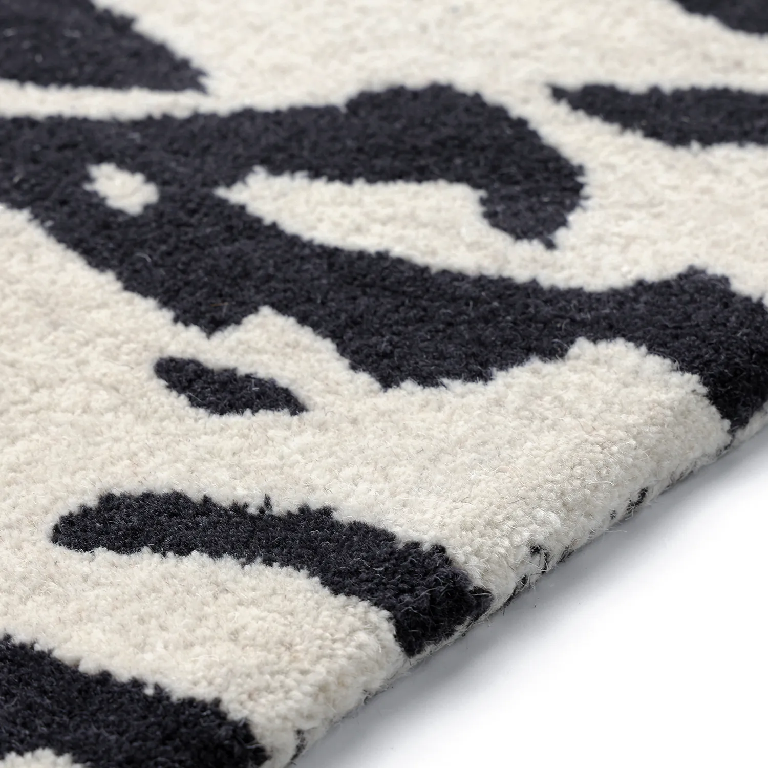 Rohožka - Zebra Tufted Wool Premium (biela/čierna)