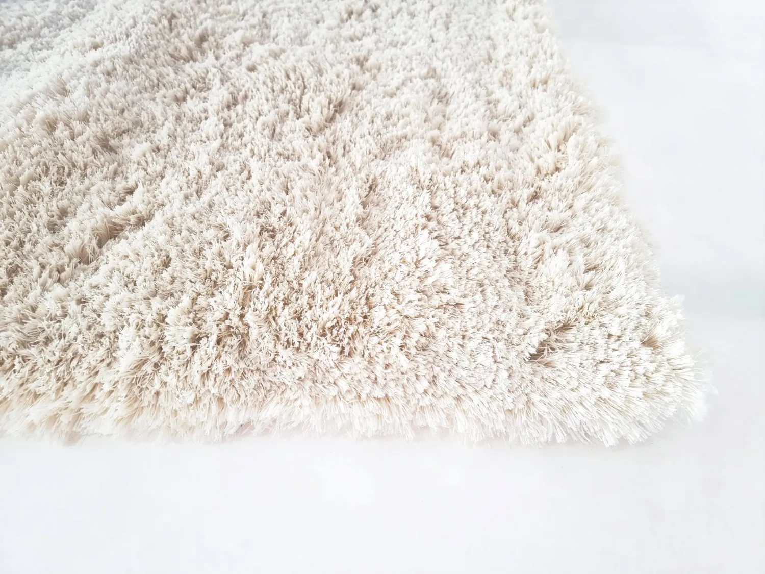 Koberce s dlhým vlasom - Kanvas (biela)