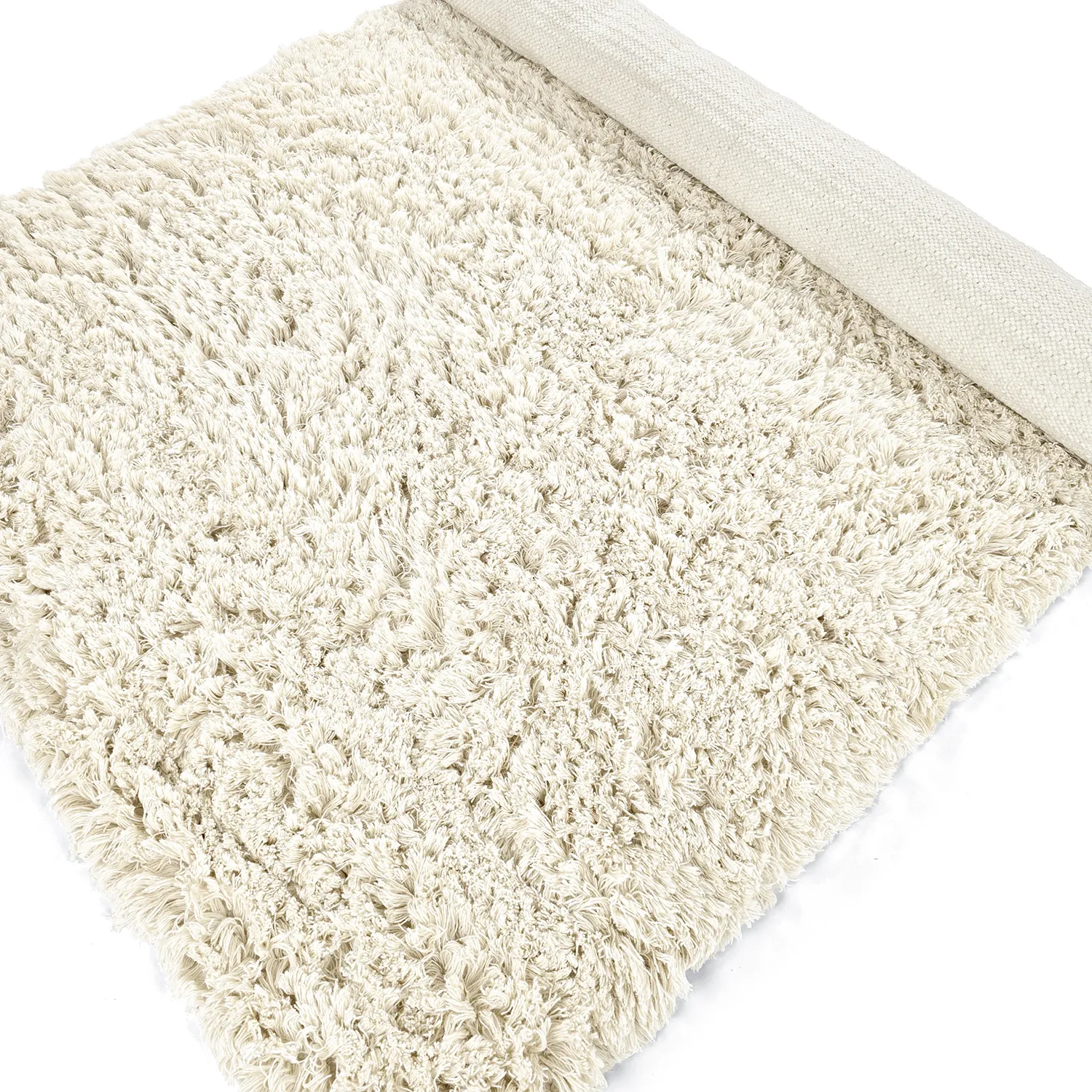 Koberce s dlhým vlasom - Fassale ručne tkaná vlnená shaggy (biela)